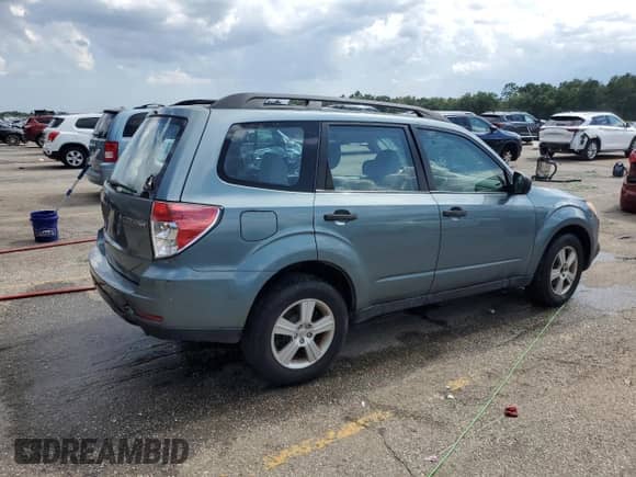 2011 Subaru Forester X with VIN JF2SHBBC5BH745062, listed as a Copart auction lot 63420555 with Not provided miles and Salvage title. Bid and sale history available at DreamBid. Image 3.