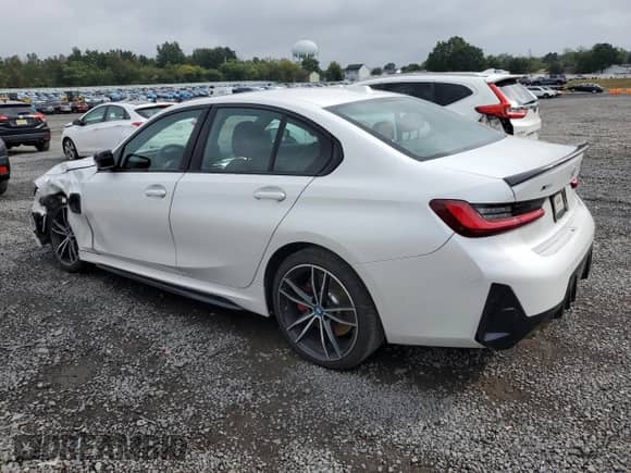 2023 BMW 3 Series 330e xDrive z VIN 3MW39FS02P8D08576, wystawiony jako Copart lot #71791275 z przebiegiem 78 069 mil mil oraz Szkoda całkowita • Salvage title. Historia ofert i sprzedaży dostępna na DreamBid. Obrazek 2.