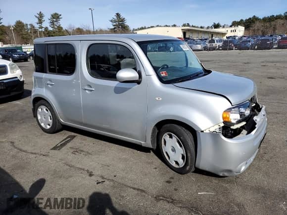 2013 Nissan Cube S with VIN JN8AZ2KR6DT301852, listed as a Copart auction lot 48990045 with 94,920 mi miles and Salvage title. Bid and sale history available at DreamBid. Image 4.