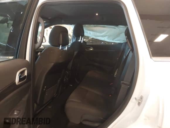 2021 Jeep Grand Cherokee Laredo E with VIN 1C4RJFAG0MC569163, listed as a IAAI auction lot 42653930 with 66,739 mi miles and . Bid and sale history available at DreamBid. Image 8.