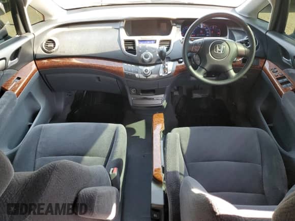 2007 Honda Odyssey z VIN RB23400651, wystawiony jako Copart lot #68772085 z przebiegiem 142 212 mil mil oraz Szkoda całkowita • Salvage title. Historia ofert i sprzedaży dostępna na DreamBid. Obrazek 8.