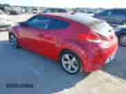 2012 Hyundai Veloster w/Gray Int z VIN KMHTC6AD0CU074696, wystawiony jako IAAI lot #43383748 z przebiegiem 140 707 mil mil oraz . Historia ofert i sprzedaży dostępna na DreamBid. Obrazek 3.