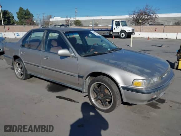 1991 Honda Accord LX z VIN JHMCB7652MC035838, wystawiony jako IAAI lot #41329502 z przebiegiem 176 816 mil mil oraz . Historia ofert i sprzedaży dostępna na DreamBid. Obrazek 1.