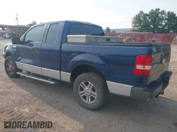 2007 Ford F-150 STX with VIN 1FTRX12W57KA53950, listed as a IAAI auction lot 43133792 with 222,285 mi miles and . Bid and sale history available at DreamBid. Image 3.
