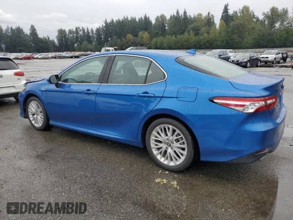 2019 Toyota Camry Hybrid LE с VIN 4T1B21HK9KU010337, выставлен на аукционе Copart как лот 84294555 с пробегом 35 132 миль миль и Списание • Salvage title. История ставок и продаж доступна на DreamBid. Изображение 2.