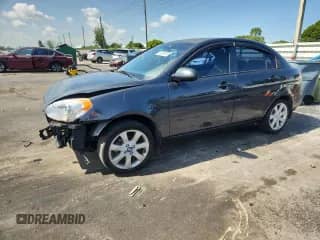 2009 Hyundai Accent Auto GLS with VIN KMHCM46C19U298215, listed as a Copart auction lot 70274975 with 148,290 mi miles and Salvage title. Bid and sale history available at DreamBid. Image 1.