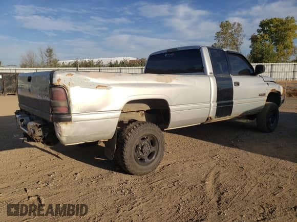 2002 Dodge 2500 with VIN 3B7KF23642M256418, listed as a Copart auction lot 71665395 with 94,189 mi miles and Salvage title. Bid and sale history available at DreamBid. Image 3.