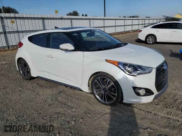 2016 Hyundai Veloster Turbo with VIN KMHTC6AEXGU289985, listed as a Copart auction lot 82231985 with 194,899 mi miles and Salvage title. Bid and sale history available at DreamBid. Image 4.