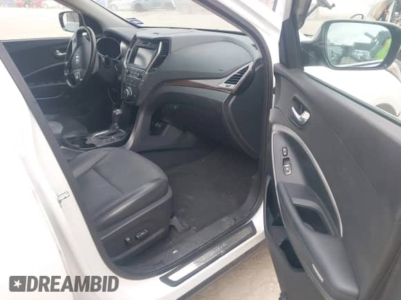 2017 Hyundai Santa Fe 2.0T with VIN 5NMZUDLA8HH045920, listed as a IAAI auction lot 42698147 with 68,609 mi miles and . Bid and sale history available at DreamBid. Image 5.