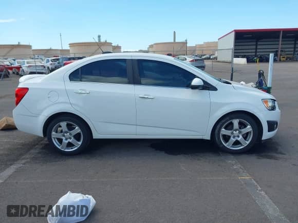 2016 Chevrolet Sonic LTZ with VIN 1G1JE5SB0G4140823, listed as a IAAI auction lot 43078859 with 94,417 mi miles and . Bid and sale history available at DreamBid. Image 13.