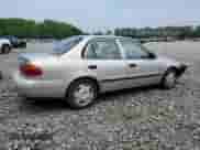 2002 Chevrolet Prizm с VIN 1Y1SK52852Z407762, выставлен на аукционе Copart как лот 59411165 с пробегом Не указан миль и Списание • Salvage title. История ставок и продаж доступна на DreamBid. Изображение 3.