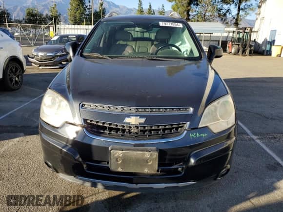 2014 Chevrolet Captiva Sport LTZ z VIN 3GNAL4EK6ES569410, wystawiony jako Copart lot #79771094 z przebiegiem 142 157 mil mil oraz Szkoda całkowita • Salvage title. Historia ofert i sprzedaży dostępna na DreamBid. Obrazek 5.