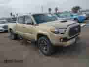 2020 Toyota Tacoma SR5 z VIN 3TMBZ5DN5LM026533, wystawiony jako IAAI lot #41529069 z przebiegiem 87 710 mil mil oraz . Historia ofert i sprzedaży dostępna na DreamBid. Obrazek 1.