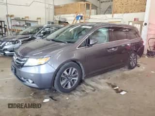 2014 Honda Odyssey Touring с VIN 5FNRL5H92EB053130, выставлен на аукционе Copart как лот 72065745 с пробегом 136 940 миль миль и Списание • Salvage title. История ставок и продаж доступна на DreamBid. Изображение 1.