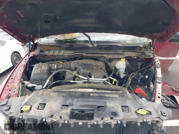 2014 Ram 1500 Express z VIN 3C6JR6ATXEG310186, wystawiony jako IAAI lot #42221601 z przebiegiem 56 684 mil mil oraz . Historia ofert i sprzedaży dostępna na DreamBid. Obrazek 10.