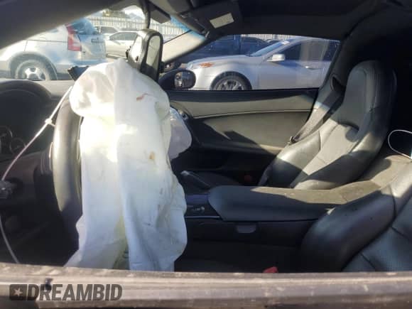 2011 Chevrolet Corvette Z16 Grand Sport 2LT with VIN 1G1YV2DW2B5107113, listed as a Copart auction lot 84974084 with Not provided miles and Non repairable. Bid and sale history available at DreamBid. Image 7.