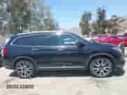 2022 Honda Pilot Touring 8-Passenger with VIN 5FNYF5H94NB004420, listed as a IAAI auction lot 42223140 with 43,210 mi miles and . Bid and sale history available at DreamBid. Image 13.