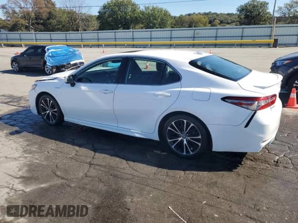 2019 Toyota Camry Hybrid SE с VIN 4T1B21HKXKU520194, выставлен на аукционе Copart как лот 86868045 с пробегом 100 431 миль миль и Списание • Salvage title. История ставок и продаж доступна на DreamBid. Изображение 2.