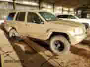 2000 Jeep Grand Cherokee Limited with VIN 1J4GW58N0YC419352, listed as a Copart auction lot 86405605 with 211,579 mi miles and Clean title. Bid and sale history available at DreamBid. Image 4.