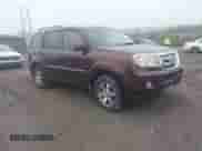 2010 Honda Pilot Touring with VIN 5FNYF4H91AB013855, listed as a IAAI auction lot 43258943 with 245,204 mi miles and . Bid and sale history available at DreamBid. Image 1.