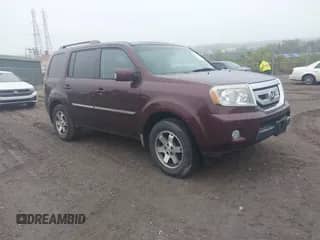 2010 Honda Pilot Touring with VIN 5FNYF4H91AB013855, listed as a IAAI auction lot 43258943 with 245,204 mi miles and . Bid and sale history available at DreamBid. Image 1.