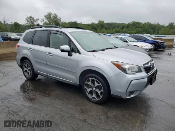 2016 Subaru Forester XT Touring with VIN JF2SJGVC8GH564168, listed as a Copart auction lot 69778935 with 219,171 mi miles and Clean title. Bid and sale history available at DreamBid. Image 4.