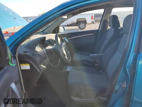 2009 Chevrolet Aveo 1LT z VIN KL1TD66E29B340184, wystawiony jako Copart lot #80269194 z przebiegiem 171 791 mil mil oraz Szkoda całkowita • Salvage title. Historia ofert i sprzedaży dostępna na DreamBid. Obrazek 7.
