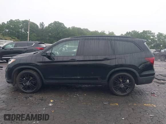 2020 Honda Pilot Black Edition z VIN 5FNYF6H71LB060106, wystawiony jako IAAI lot #42358912 z przebiegiem 86 429 mil mil oraz . Historia ofert i sprzedaży dostępna na DreamBid. Obrazek 14.