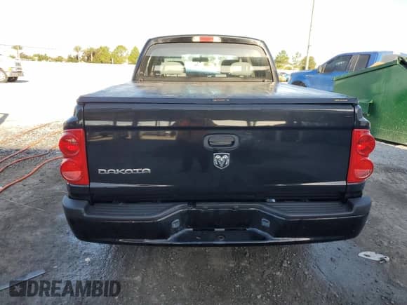 2008 Dodge Dakota SXT с VIN 1D7HE38K38S553825, выставлен на аукционе Copart как лот 62829315 с пробегом 118 348 миль миль и Списание • Salvage title. История ставок и продаж доступна на DreamBid. Изображение 6.