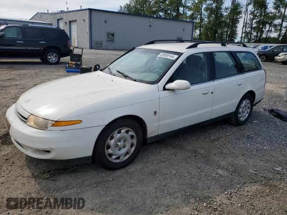 2001 Saturn LW with VIN 1G8JU82F21Y503583, listed as a Copart auction lot 65959144 with Not provided miles and Salvage title. Bid and sale history available at DreamBid. Image 1.