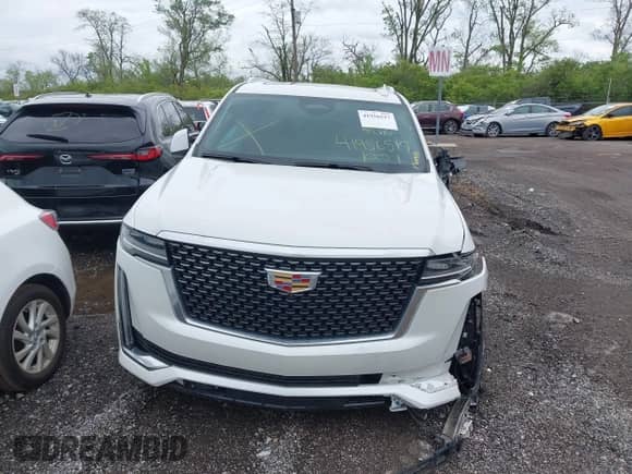 2021 Cadillac Escalade Premium Luxury z VIN 1GYS4CKL2MR216112, wystawiony jako IAAI lot #41956517 z przebiegiem 59 216 mil mil oraz . Historia ofert i sprzedaży dostępna na DreamBid. Obrazek 13.