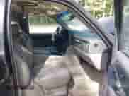 2003 Chevrolet Tahoe LS z VIN 1GNEC13Z13R147626, wystawiony jako IAAI lot #42633391 z przebiegiem 292 095 mil mil oraz . Historia ofert i sprzedaży dostępna na DreamBid. Obrazek 5.