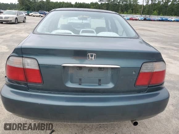 1997 Honda Accord LX with VIN 1HGCD5638VA053287, listed as a Copart auction lot 71704015 with 332,299 mi miles and Clean title. Bid and sale history available at DreamBid. Image 6.