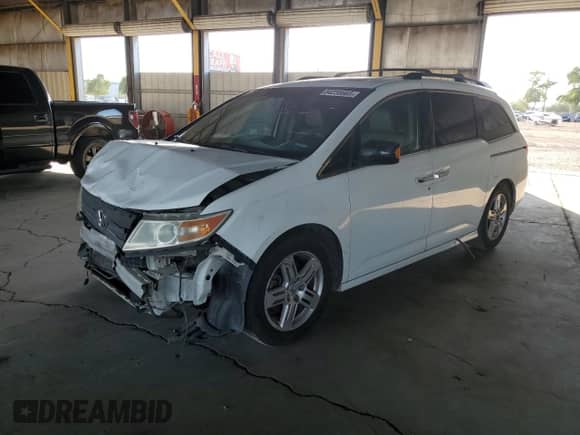 2011 Honda Odyssey Touring с VIN 5FNRL5H90BB029226, выставлен на аукционе Copart как лот 84238665 с пробегом Не указан миль и Чистый • Clean title. История ставок и продаж доступна на DreamBid. Изображение 1.