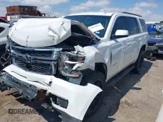 2019 Chevrolet Tahoe LT with VIN 1GNSCBKC2KR399227, listed as a IAAI auction lot 43164071 with 104,044 mi miles and . Bid and sale history available at DreamBid. Image 2.