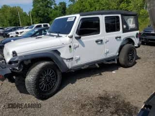 2023 Jeep Wrangler Sport with VIN 1C4HJXDGXPW596127, listed as a Copart auction lot 65395655 with 64,257 mi miles and Salvage title. Bid and sale history available at DreamBid. Image 1.