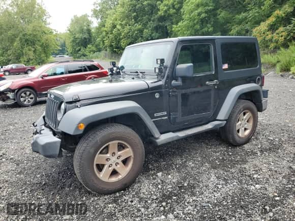 2018 Jeep Wrangler Sport S with VIN 1C4AJWAG7JL882414, listed as a Copart auction lot 67066205 with 164,179 mi miles and Salvage title. Bid and sale history available at DreamBid. Image 1.