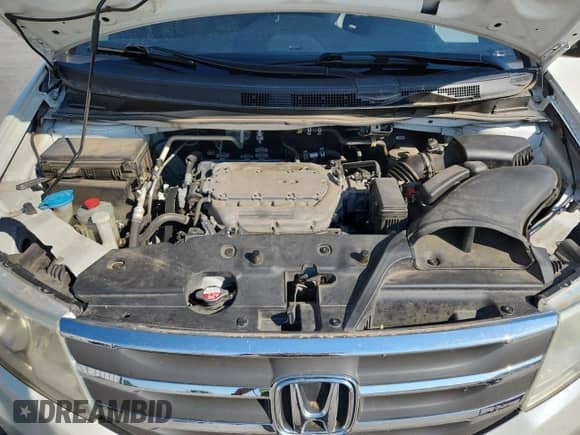 2013 Honda Odyssey Touring с VIN 5FNRL5H90DB060222, выставлен на аукционе Copart как лот 86769145 с пробегом 166 753 миль миль и Списание • Salvage title. История ставок и продаж доступна на DreamBid. Изображение 12.