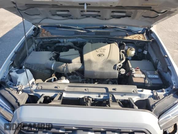2021 Toyota Tacoma SR5 с VIN 5TFDZ5BN4MX056775, выставлен на аукционе Copart как лот 70674325 с пробегом 55 403 миль миль и Списание • Salvage title. История ставок и продаж доступна на DreamBid. Изображение 11.