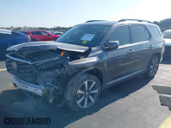 2025 Honda Pilot Touring с VIN 5FNYG2H72SB014420, выставлен на аукционе IAAI как лот 42332505 с пробегом 20 172 миль миль и . История ставок и продаж доступна на DreamBid. Изображение 2.