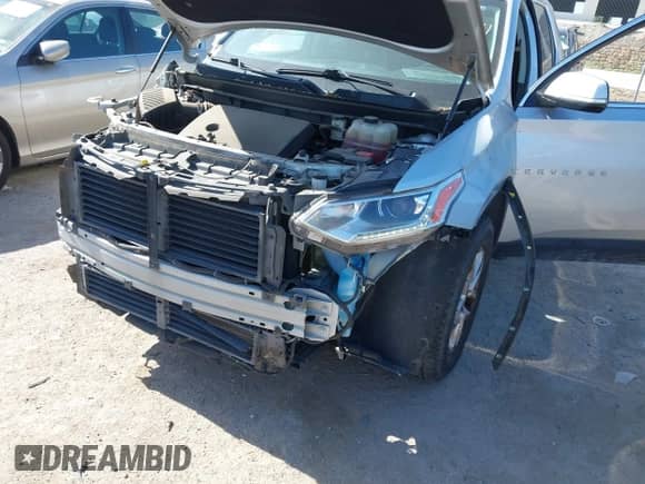 2018 Chevrolet Traverse LT Cloth z VIN 1GNERGKW0JJ153194, wystawiony jako IAAI lot #42827481 z przebiegiem 124 559 mil mil oraz . Historia ofert i sprzedaży dostępna na DreamBid. Obrazek 6.