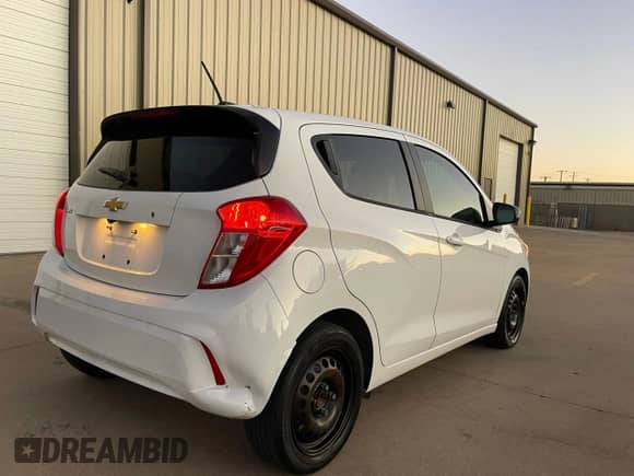 2017 Chevrolet Spark LS with VIN KL8CA6SA2HC832400, listed as a Copart auction lot 80999134 with 156,473 mi miles and Clean title. Bid and sale history available at DreamBid. Image 4.
