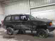 1993 Jeep Grand Cherokee with VIN 1J4GZ68S6PC579995, listed as a IAAI auction lot 43282637 with 172,681 mi miles and . Bid and sale history available at DreamBid. Image 14.