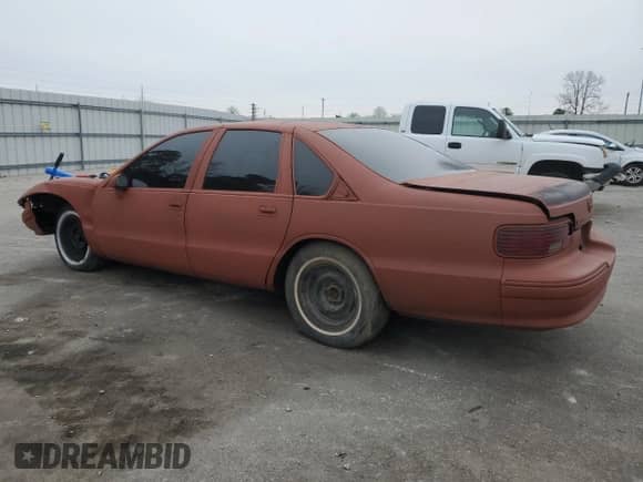 1994 Chevrolet Caprice LS z VIN 1G1BN52P9RR179402, wystawiony jako Copart lot #87580475 z przebiegiem 849 mil mil oraz Szkoda całkowita • Salvage title. Historia ofert i sprzedaży dostępna na DreamBid. Obrazek 2.
