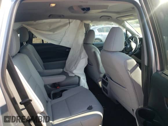 2021 Honda Pilot Touring 7-Passenger с VIN 5FNYF6H62MB066764, выставлен на аукционе Copart как лот 58723205 с пробегом 45 718 миль миль и Списание • Salvage title. История ставок и продаж доступна на DreamBid. Изображение 11.