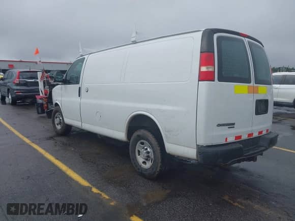 2013 Chevrolet Express Cargo with VIN 1GCWGFCA0D1137033, listed as a IAAI auction lot 42897883 with 149,255 mi miles and . Bid and sale history available at DreamBid. Image 3.