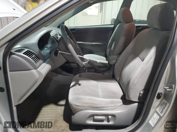 2003 Toyota Camry XLE с VIN 4T1BE32KX3U729691, выставлен на аукционе Copart как лот 84183735 с пробегом 263 739 миль миль и Списание • Salvage title. История ставок и продаж доступна на DreamBid. Изображение 7.