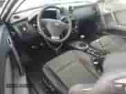 2006 Hyundai Tiburon GS z VIN KMHHM65D06U205823, wystawiony jako Copart lot #87125445 z przebiegiem 158 410 mil mil oraz Czysty tytuł • Clean title. Historia ofert i sprzedaży dostępna na DreamBid. Obrazek 8.