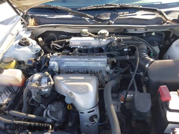 2000 Toyota Camry LE z VIN JT2BG22KXY0428953, wystawiony jako IAAI lot #43458115 z przebiegiem 158 994 mil mil oraz . Historia ofert i sprzedaży dostępna na DreamBid. Obrazek 10.