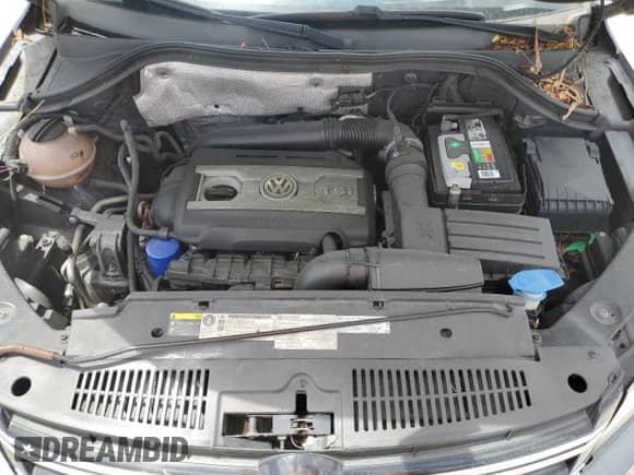 2013 Volkswagen Tiguan SE z VIN WVGAV3AX4DW581925, wystawiony jako Copart lot #55970105 z przebiegiem 115 504 mil mil oraz Czysty tytuł • Clean title. Historia ofert i sprzedaży dostępna na DreamBid. Obrazek 11.